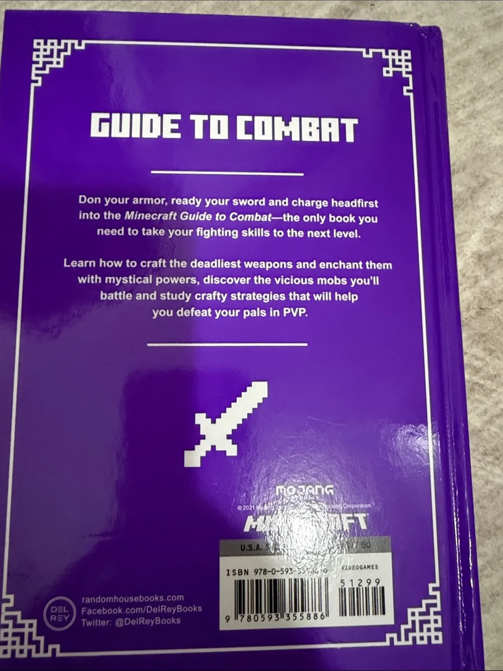 Guide to Combat — Gold Cover with Purple Accents
